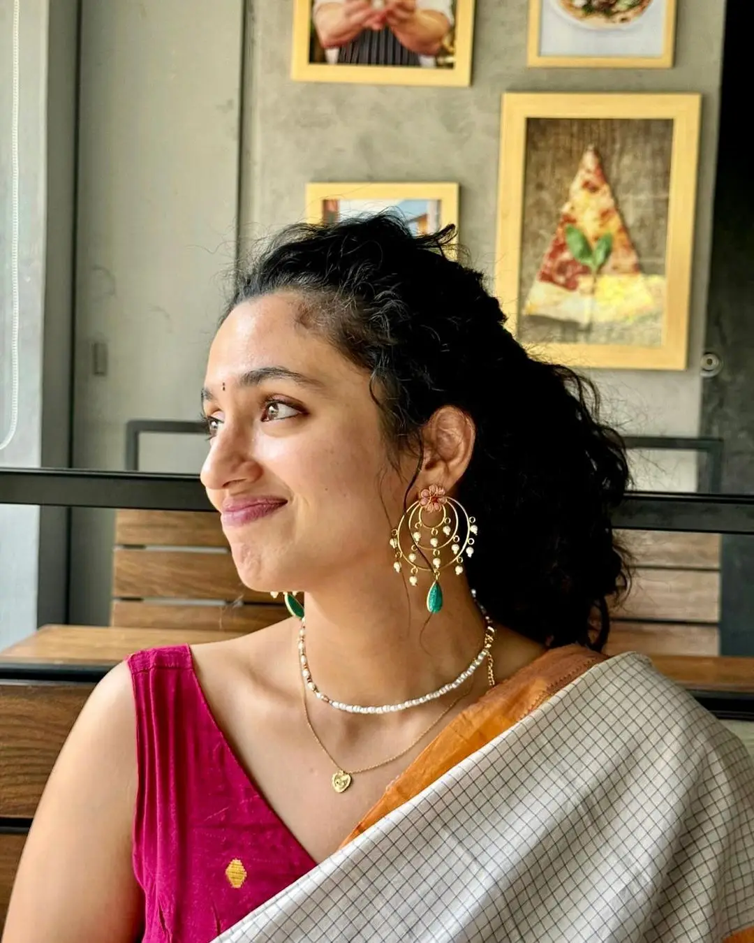 Malvika Nair in White Saree Sleeveless Red Blouse